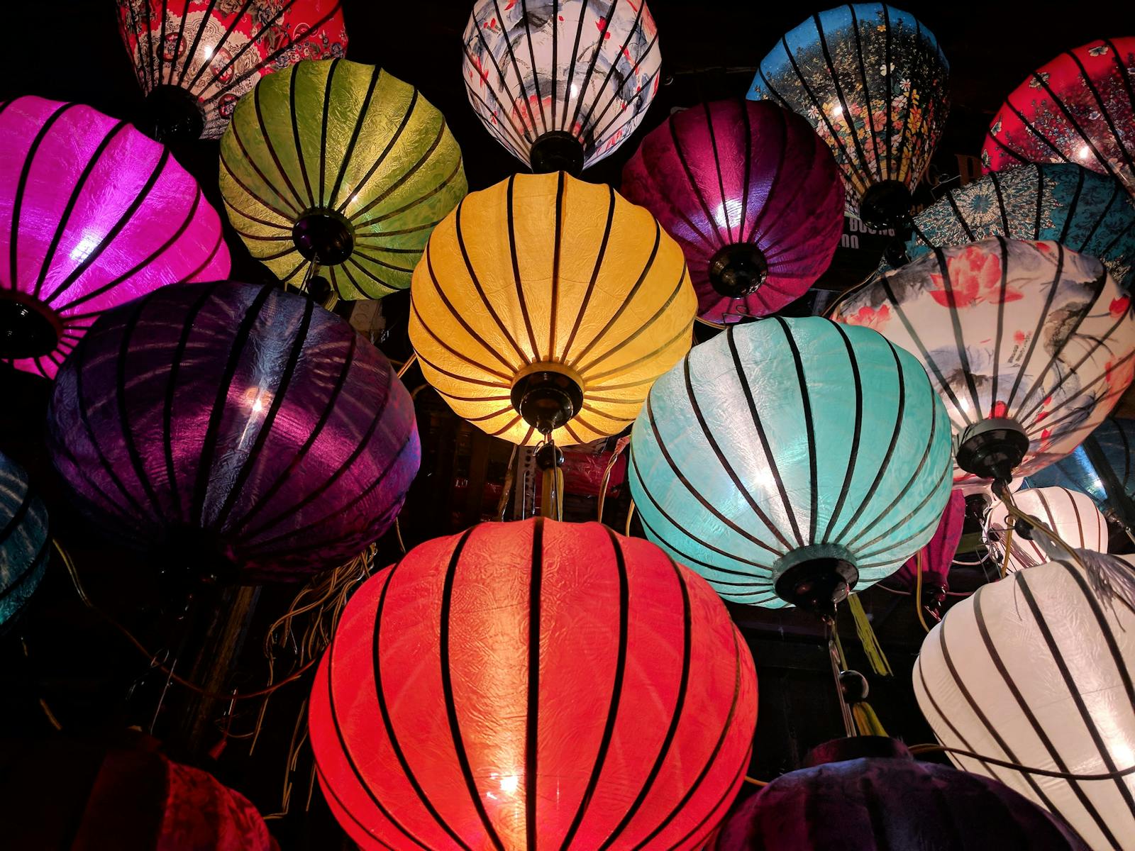 Photo by Expect Best Colorful Chinese lanterns illuminating the night, perfect for festive celebrations.